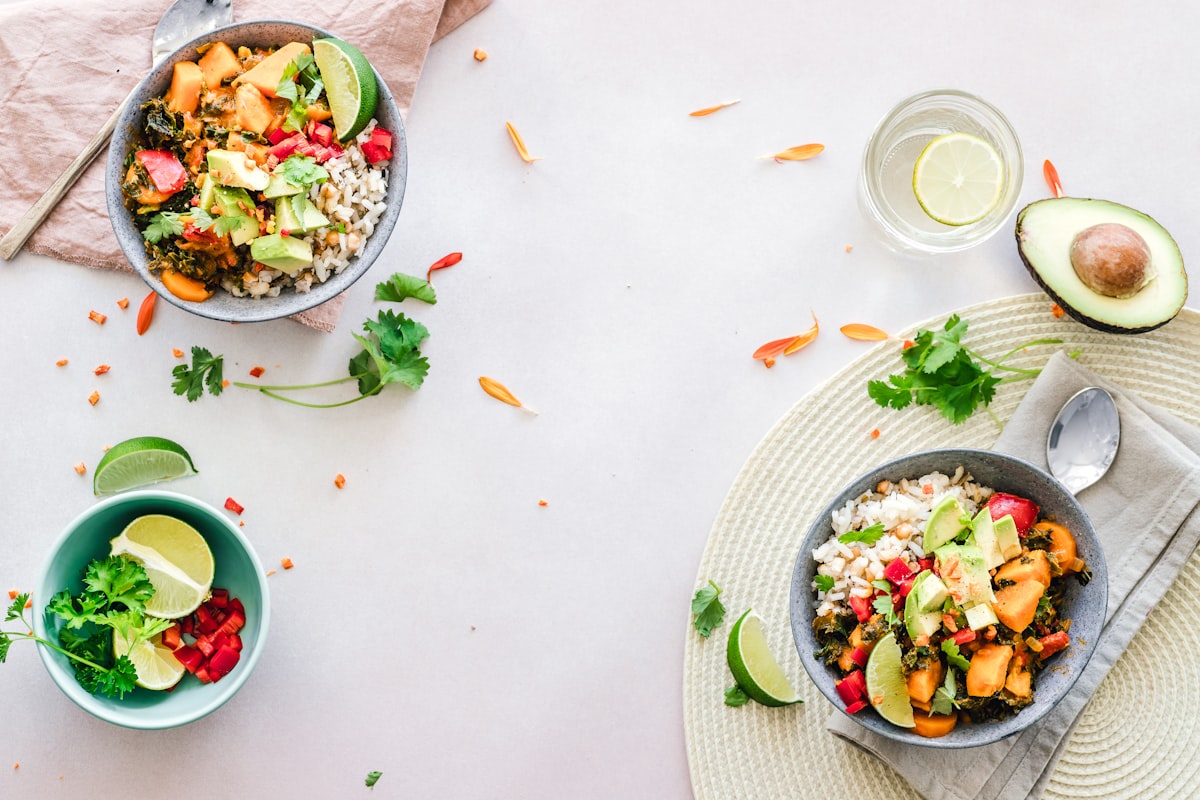 Healthy snack plate with nuts, fresh fruit, and seeds